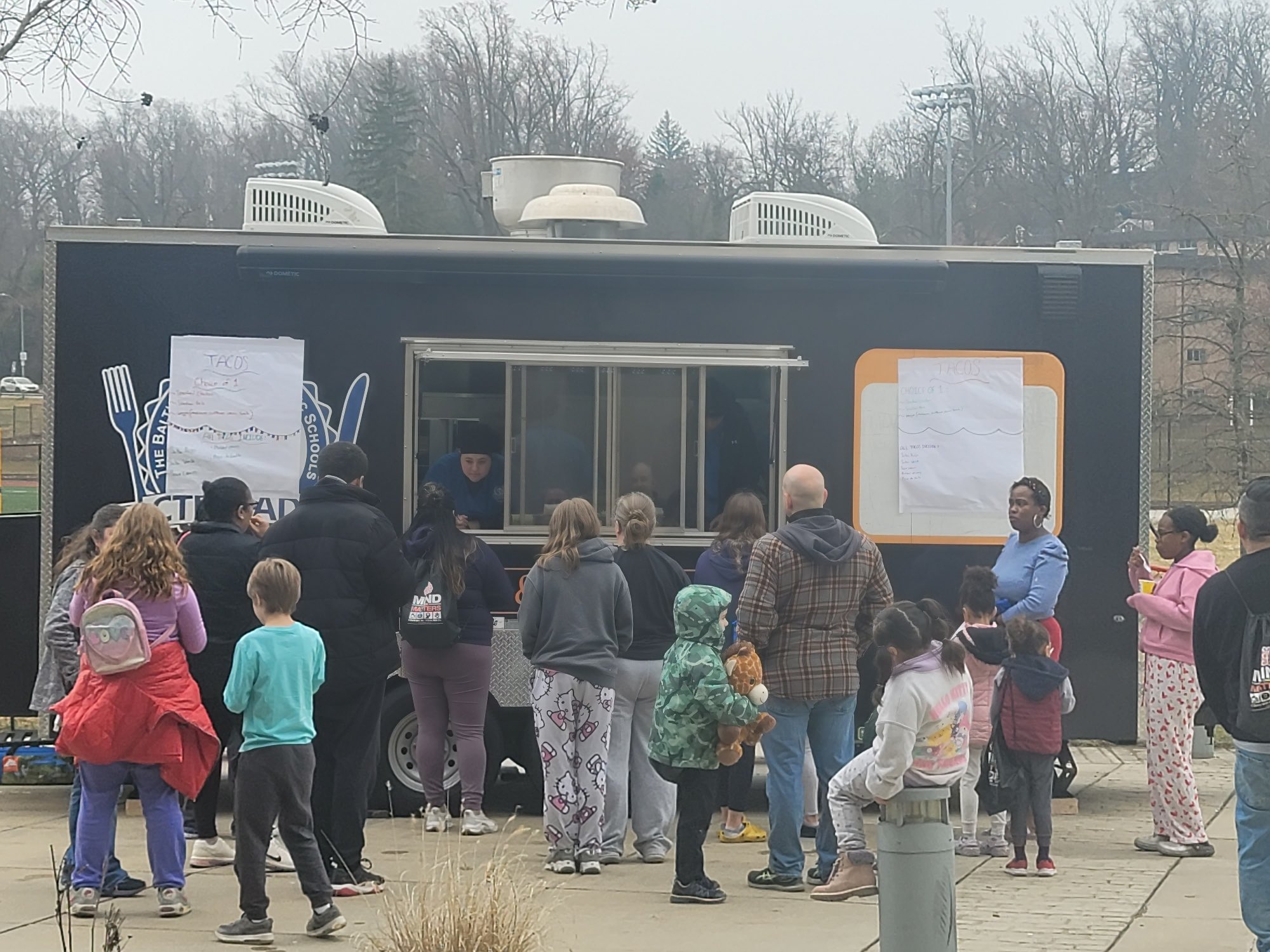 the food truck working in the park
